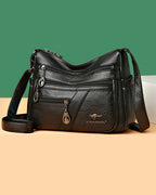 Multi-pocket soft leather crossbody bag